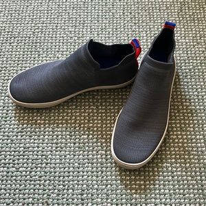 Rothy Women High top grey slip-on sneaker with orange stripe on back. Size 9.